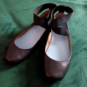 Black ballet flats with ankle straps